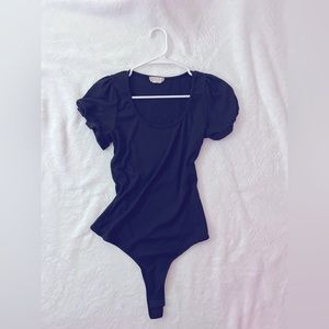 altard state black body suit with puffy sleeves